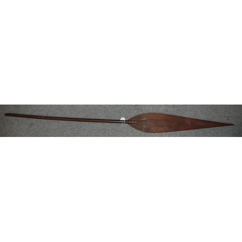 467 - A Polynesian spear and a carved tribal mask (2)...