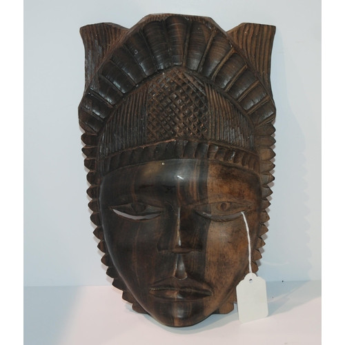 467 - A Polynesian spear and a carved tribal mask (2)...