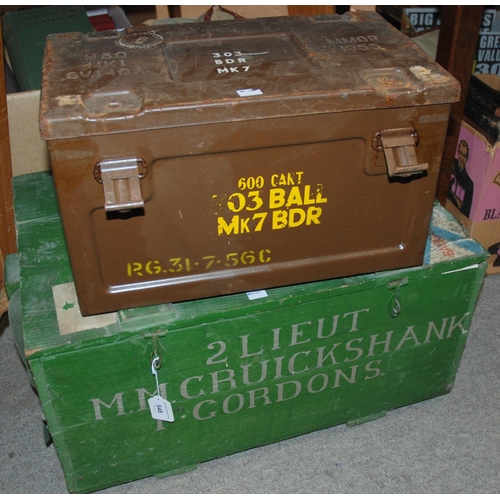 548 - A wooden military chest 2nd Lieutenant M. M. Cruickshank including caps, berets, webbing, rucksack, ...