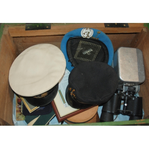 548 - A wooden military chest 2nd Lieutenant M. M. Cruickshank including caps, berets, webbing, rucksack, ...