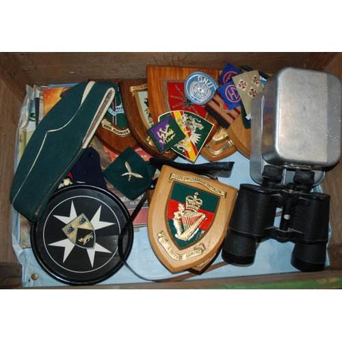 548 - A wooden military chest 2nd Lieutenant M. M. Cruickshank including caps, berets, webbing, rucksack, ...