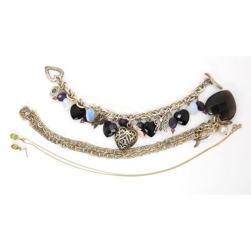 710 - A 9ct gold peridot and diamond accent pendant and one matching earring, weight 2gms, together with a...