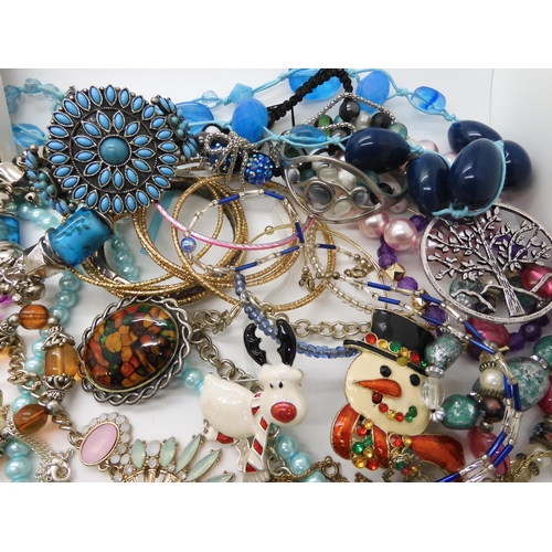 787 - A collection of costume jewellery to include items by Kirks Folly and Butler & Wilson...