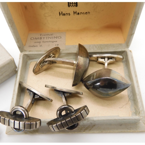 822 - A pair of Danish silver cufflinks by Hans Hansen, a further pair by John Markusen and a Danish silve...
