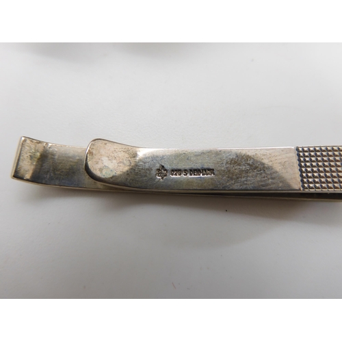 822 - A pair of Danish silver cufflinks by Hans Hansen, a further pair by John Markusen and a Danish silve...