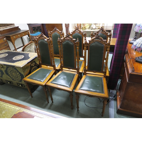 29 - A set of six Victorian mahogany dining chairs with green leather upholstery (6)