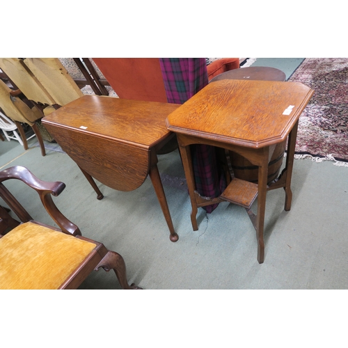 62 - An early 20th century oak drop leaf table and an oak two tier occasional table (2)