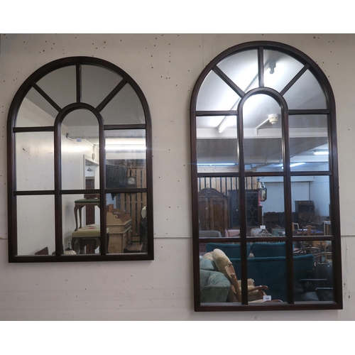 104 - A modern stained teak framed wall mirror and another similar smaller example (2) 