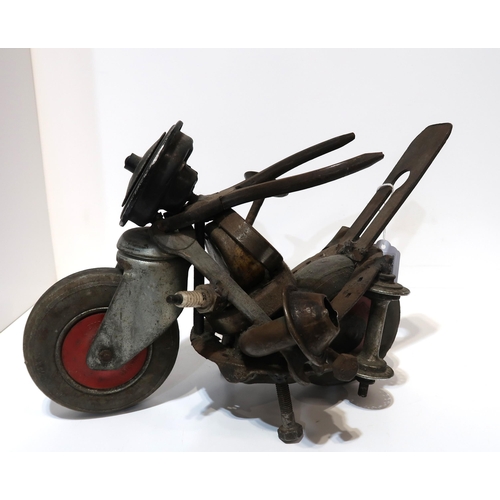 1104 - WILLEM CERNEUS (DUTCH b.1932)MOTO RED WHEELSMetal, 32cm (length)