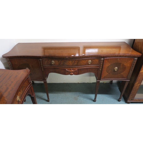 43 - A 20th century mahogany dining suite consisting extending dining table and eight chairs, serpentine ... 