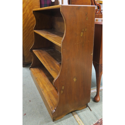 46 - A 20th century mahogany waterfall front bookcase, 89cm high x 89cm wide x 37cm deep