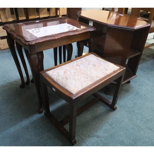 74 - A 20th century mahogany nest of three tables, oak framed foot stool and a mahogany table (3)