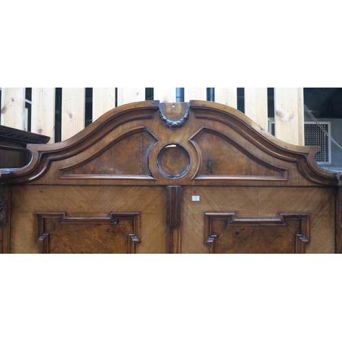 76 - A Victorian burr walnut two door continental style wardrobe, 200cm high x 124cm wide x 54cm deep