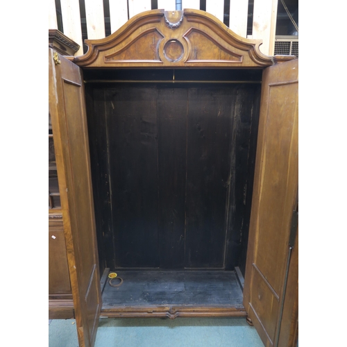 76 - A Victorian burr walnut two door continental style wardrobe, 200cm high x 124cm wide x 54cm deep