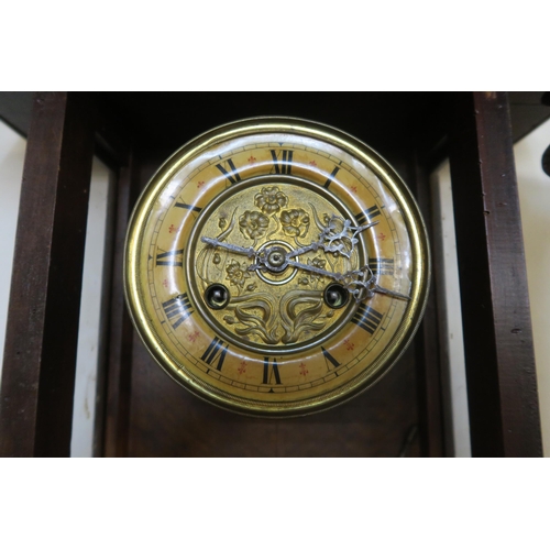 81 - A 20th century mahogany cased Vienna style wall clock