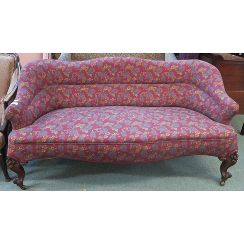 86 - A Victorian floral upholstered settee on carved mahogany supports, 73cm high x 140cm wide x 73cm dee... 