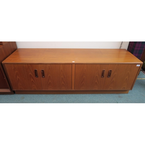 95 - A mid 20th century teak G Plan E Gomme four door cabinet base, 54cm high x 162cm wide x 46cm deep