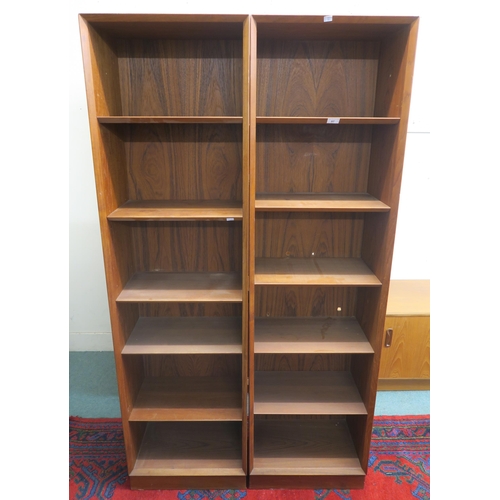 97 - A pair of mid 20th century teak Danish open bookcases, 183cm high x 50cm wide x 30cm deep (2)