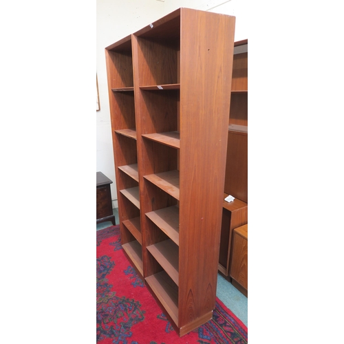 97 - A pair of mid 20th century teak Danish open bookcases, 183cm high x 50cm wide x 30cm deep (2)