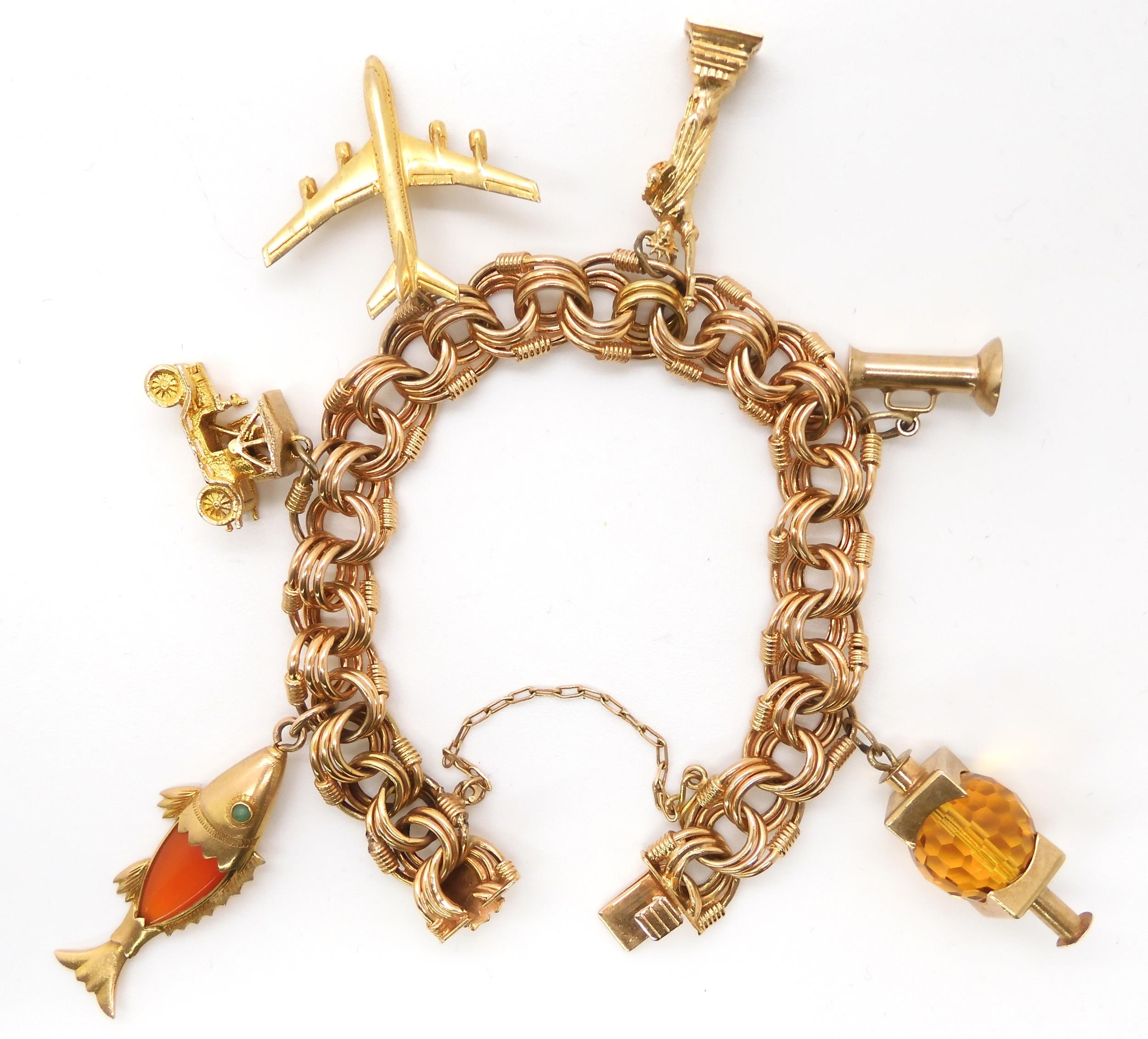 A bright yellow metal fancy link bracelet, with a yellow met...