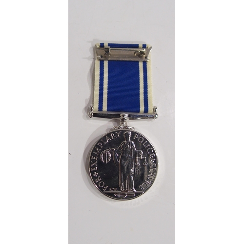 504 - A Military Police long service and good conduct medal awarded to Sargent William Christie