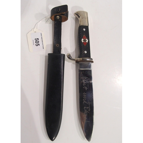 505 - A German knife and scabbard, the blade inscribed Blut und ehre