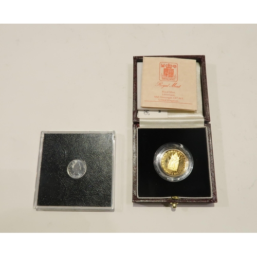 491 - A 500th anniversary of the first gold sovereign coin 7.98 grams together with a platinum 1/10 coin I... 