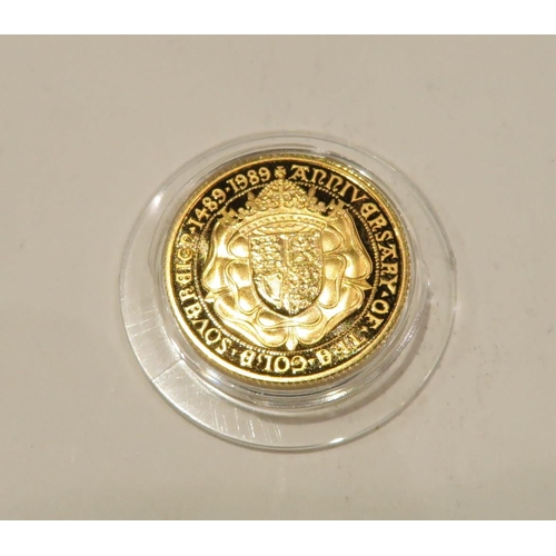 491 - A 500th anniversary of the first gold sovereign coin 7.98 grams together with a platinum 1/10 coin I... 