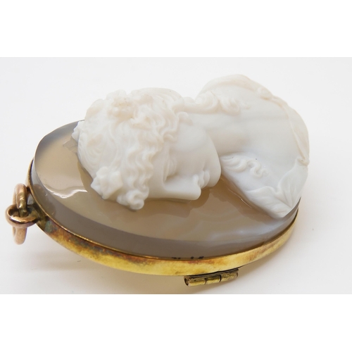 755 - A CRAFTSMAN CARVED AGATE CAMEO OF A MAIDEN mounted as a pendant brooch in yellow metal, dimensions 4... 