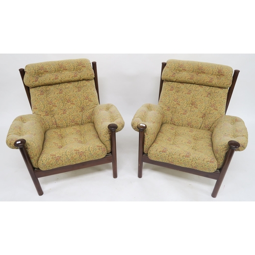 123 - A mid 20th century teak framed Guy Rogers Santa Fe three piece suite with floral buttoned upholstery... 