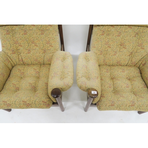 123 - A mid 20th century teak framed Guy Rogers Santa Fe three piece suite with floral buttoned upholstery... 