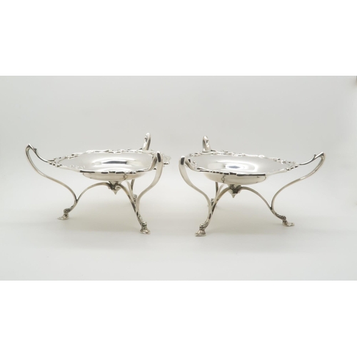 350 - A pair of Art Nouveau silver tazzas, of stylised form, by Elkington & Co, London 1907, 423gms (2... 