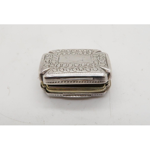 359 - A George III silver vinaigrette, of shaped rectangular form, with engraved floral decoration surroun... 