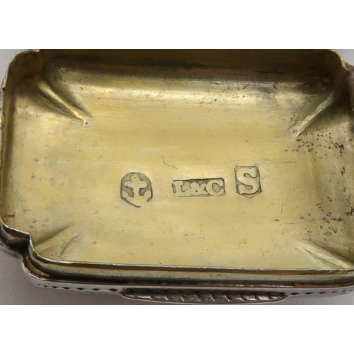 359 - A George III silver vinaigrette, of shaped rectangular form, with engraved floral decoration surroun... 