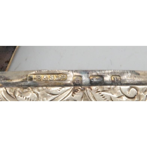 366 - A selection of silver vestas including an Edwardian example with engraved scrolling foliate decorati... 