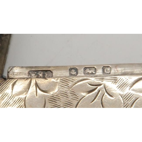 366 - A selection of silver vestas including an Edwardian example with engraved scrolling foliate decorati... 