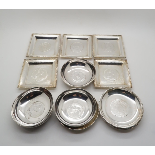 372 - A collection of white metal coin dishes, including six square and four circular examples, stamped Ho... 