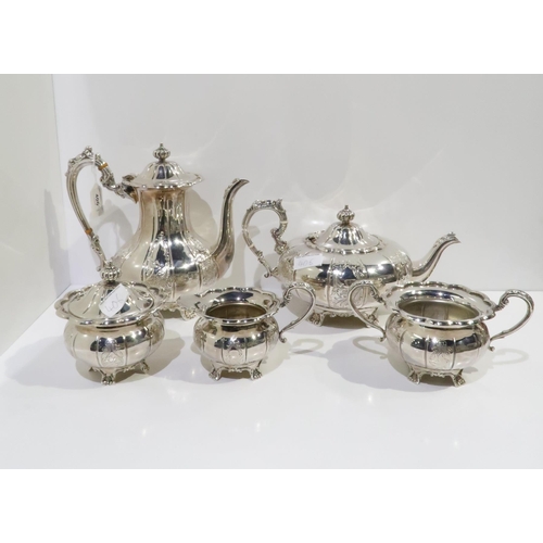 406 - A five piece EPNS tea service, the teapot of melon form, all with chased scrolling foliate decoratio... 