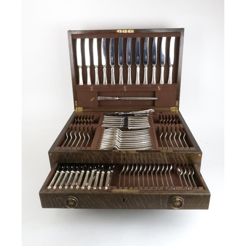 412 - A cased mahogany canteen of EPNS cutlery, by Mappin & Webb, comprising a full suite including tw... 