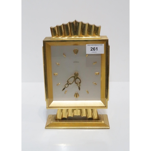 261 - An Angelus clock in gilt metal case