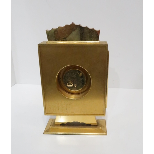 261 - An Angelus clock in gilt metal case