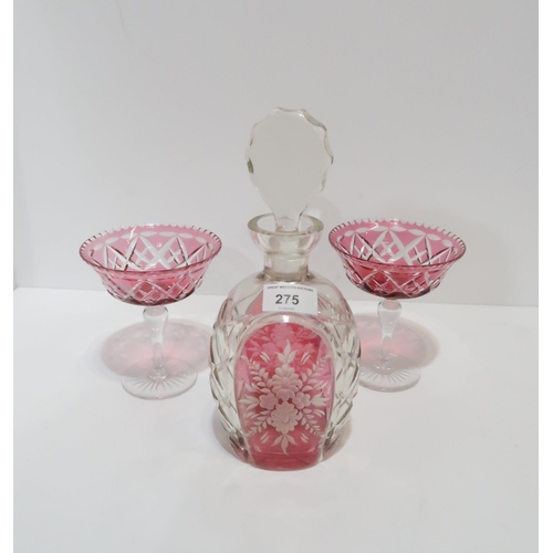 275 - A set of six Tudor champagne cocktail glasses in cranberry, clear and green, together with a cranber... 