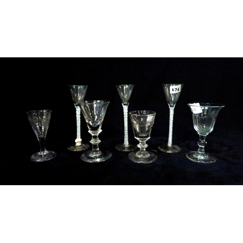 276 - Three ribbon twist glasses and four other antique glasses