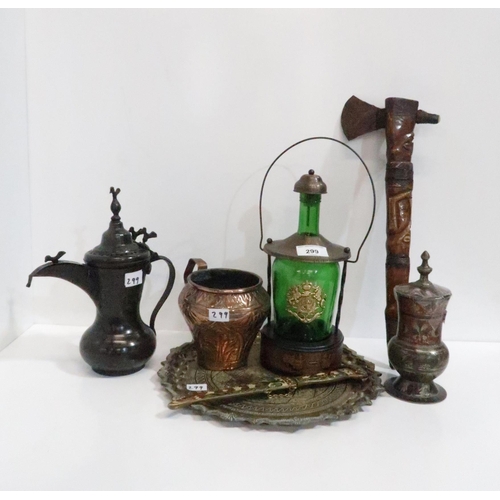 299 - Assorted middle eastern metalware including a coffee pot, a copper vessel, a brass tray etc (the hat... 