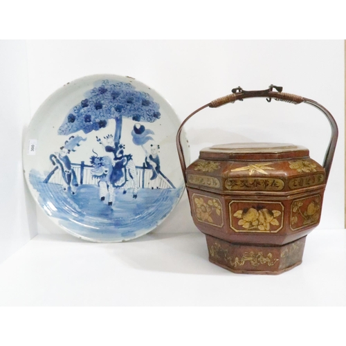 300 - A blue and white charger decorated with a figure on the back of a Kylin, 40cm diameter and a lacquer... 