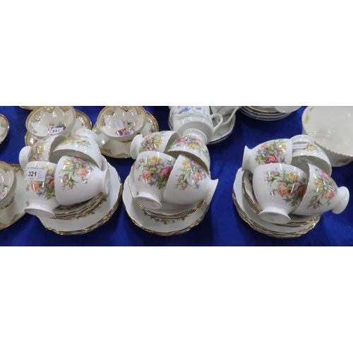 321 - A Roslyn China Royal Rose pattern tea service together with Bavarian cups and saucers