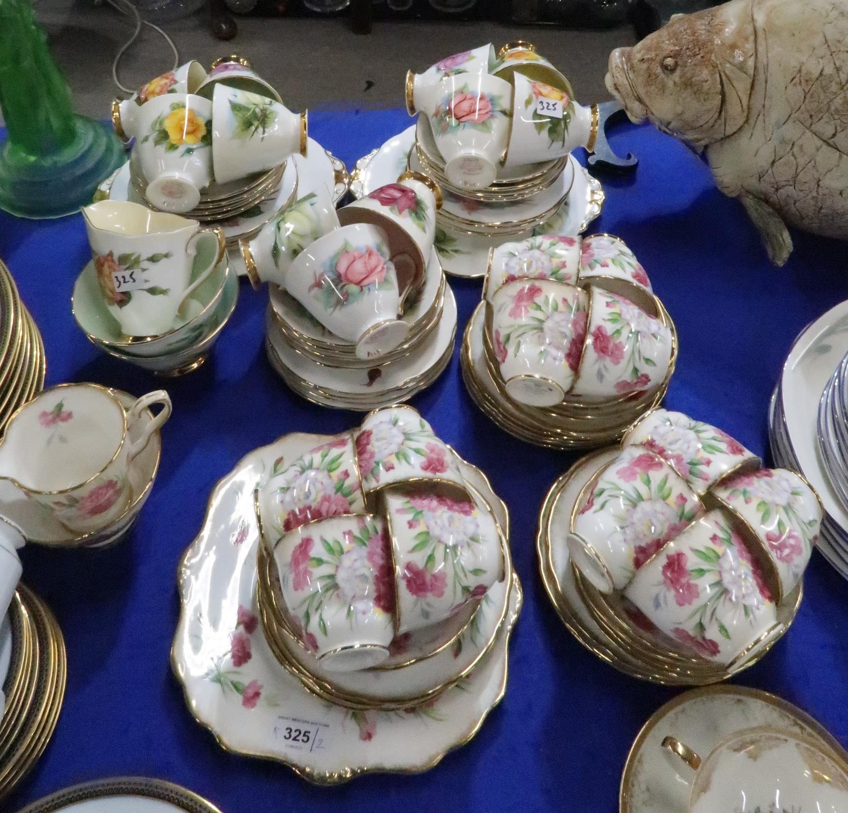 A Royal Stafford Carnation pattern teaset and a Roslyn China...