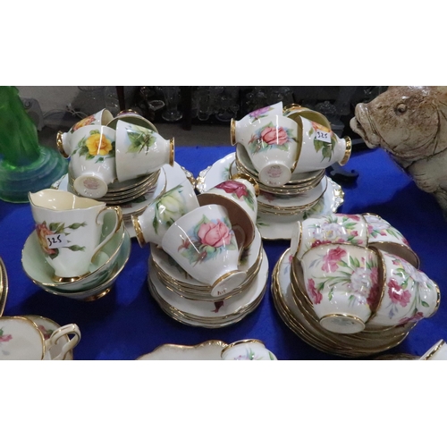 325 - A Royal Stafford Carnation pattern teaset and a Roslyn China Wheatcroft Roses teaset