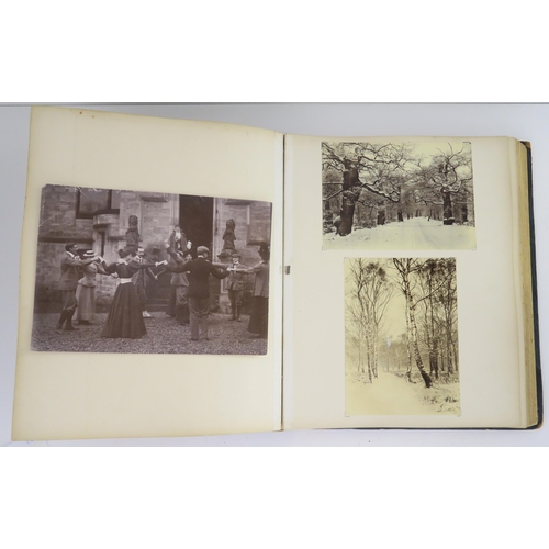 435 - a photographic and country house scrap album comprising; 1890s photographs of Sark, Skye, Aviemore, ... 