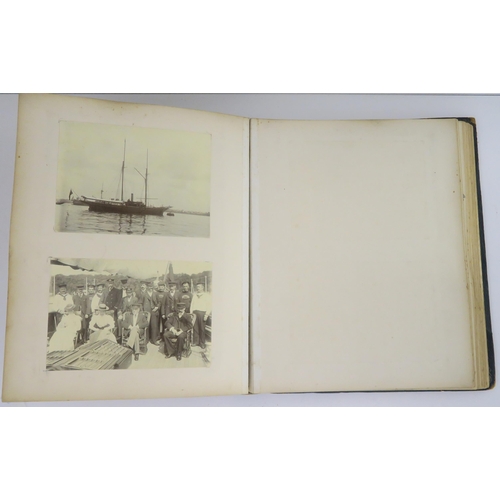 435 - a photographic and country house scrap album comprising; 1890s photographs of Sark, Skye, Aviemore, ... 